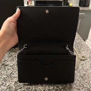 Gucci bag. It’s in perfect condition kept it on the shelf as a decoration.